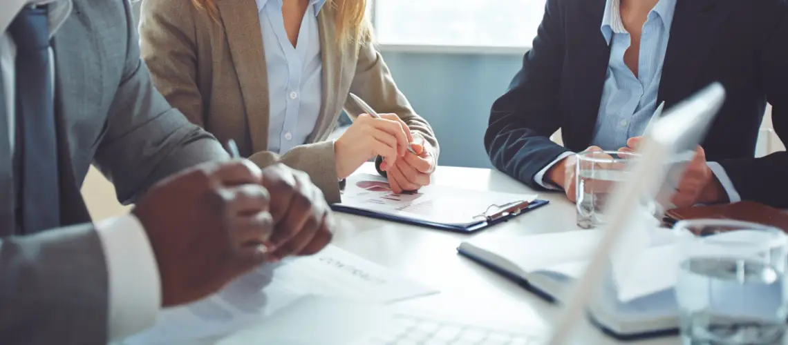 A professional property valuer reviewing reports in Brisbane